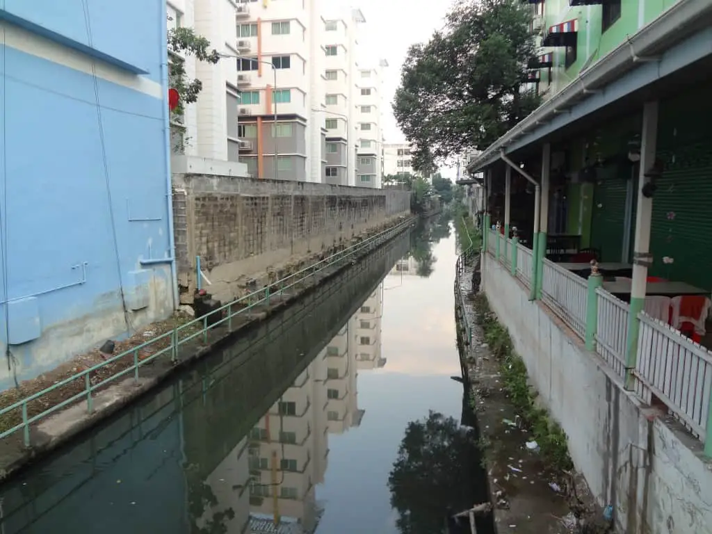 The scummy and rancid canal I walk over at least twice per day.  It always seems to be flowing toward the Chao Phraya River in the morning and away from it at night.