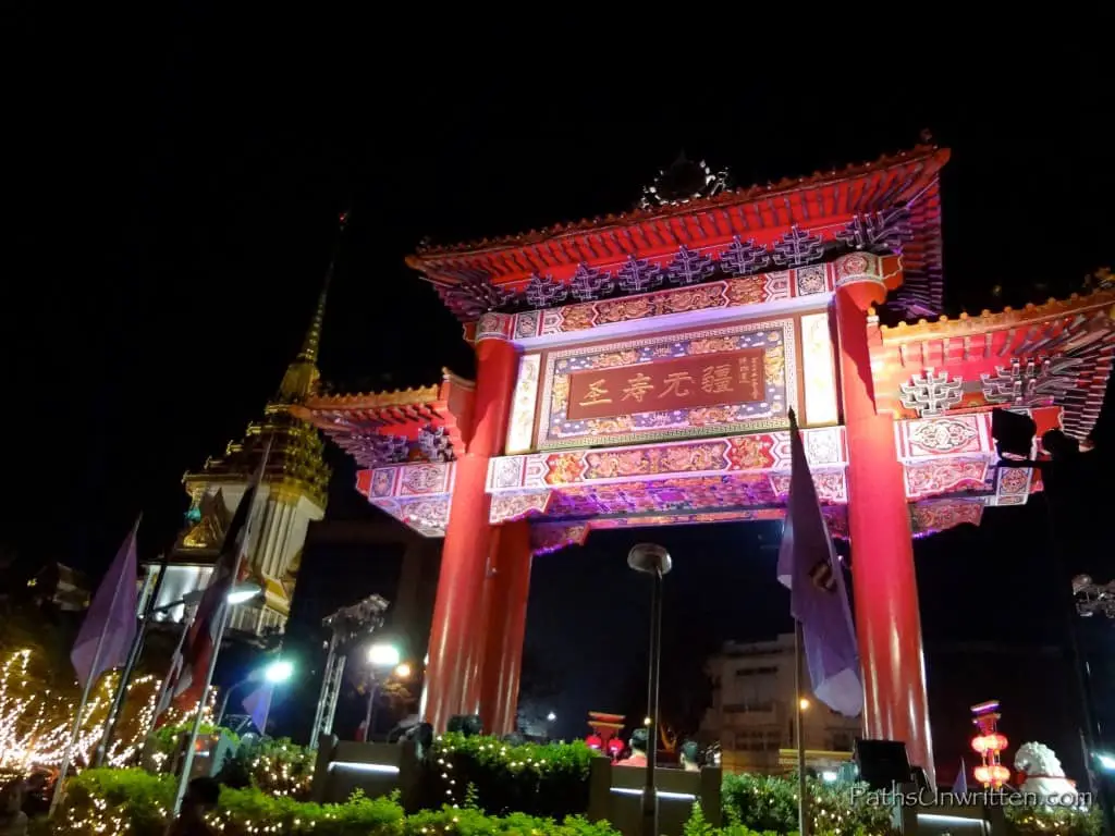 The Chinatown Gate and Wat Traimit behind it.