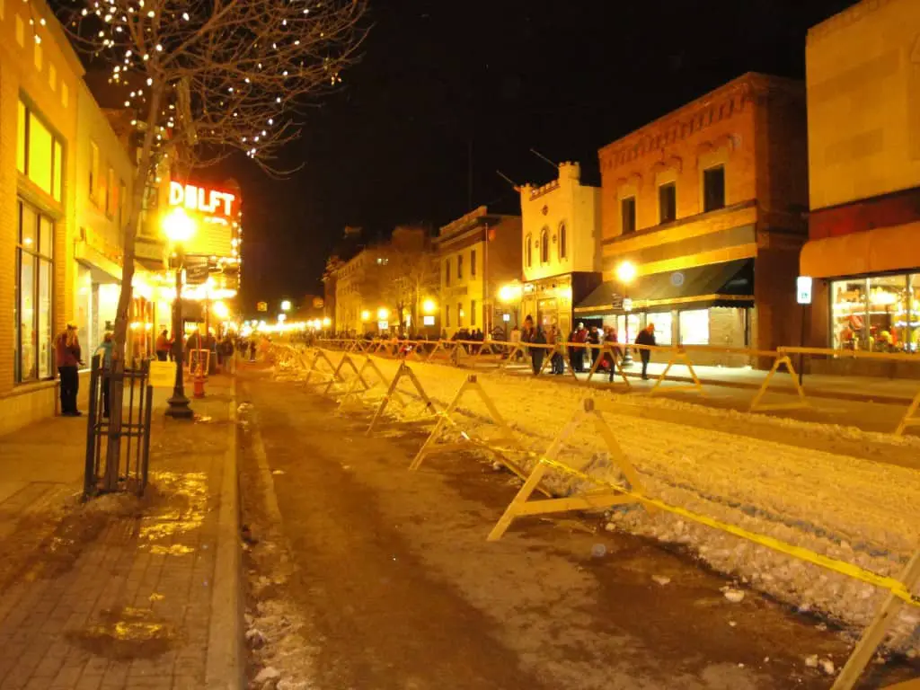 The main street of Marquette, Michigan barricaded for snowmobiles during the winter.