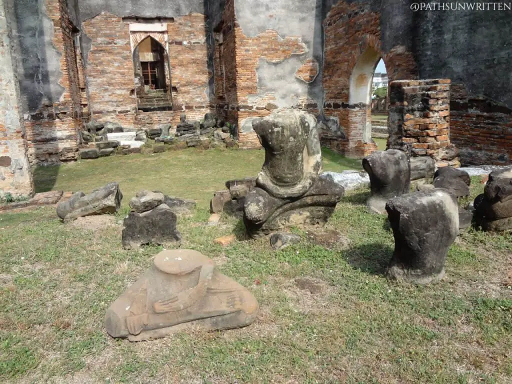 The remains of the Buddha statue inside the wiharn.
