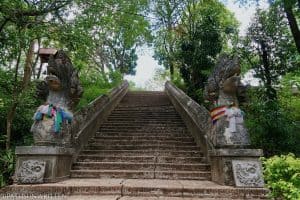 The Naga staircase leading to Wat Umong's couryard and stupa.