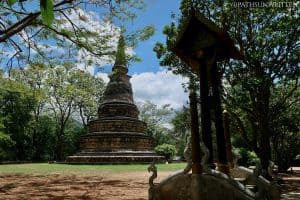 The stupa and gong in the courtyard above Wat Umong's tunnels.