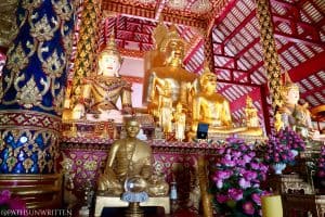 The collection of Buddha statues inside Wat Suan Dok.