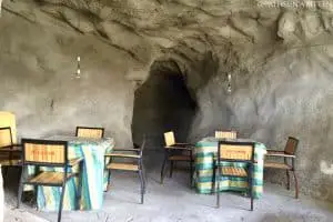 Cave shelter in the mountainside turned into a mahjong parlor.
