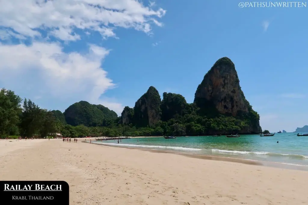 Railay's white sand beach is surrounded on all sides by limestone cliffs.