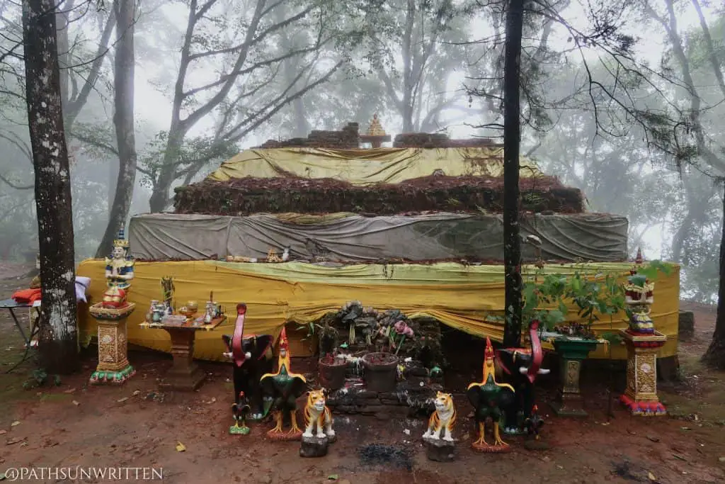 The eastern face of the San Ku stupa with offerings.