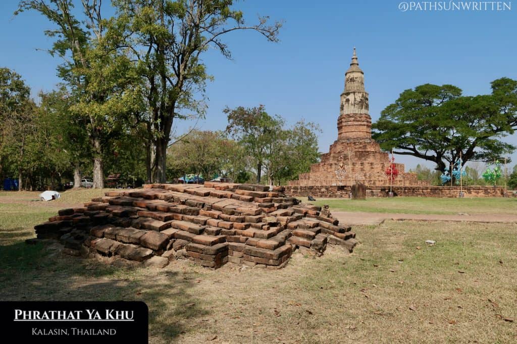 Ruined stupa base and Lan Xang style restoration at Phrathat Ya Khu in Kalasin Province.