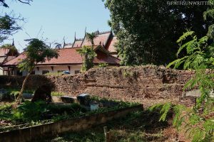 A section of the Lanna-era brick city wall at Wat Pratu Pong in Lampang