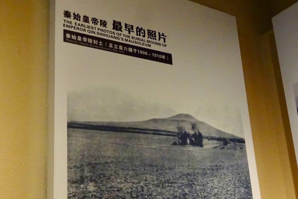 An early photo of the Qin Shi Huang burial mound on display at the site museum